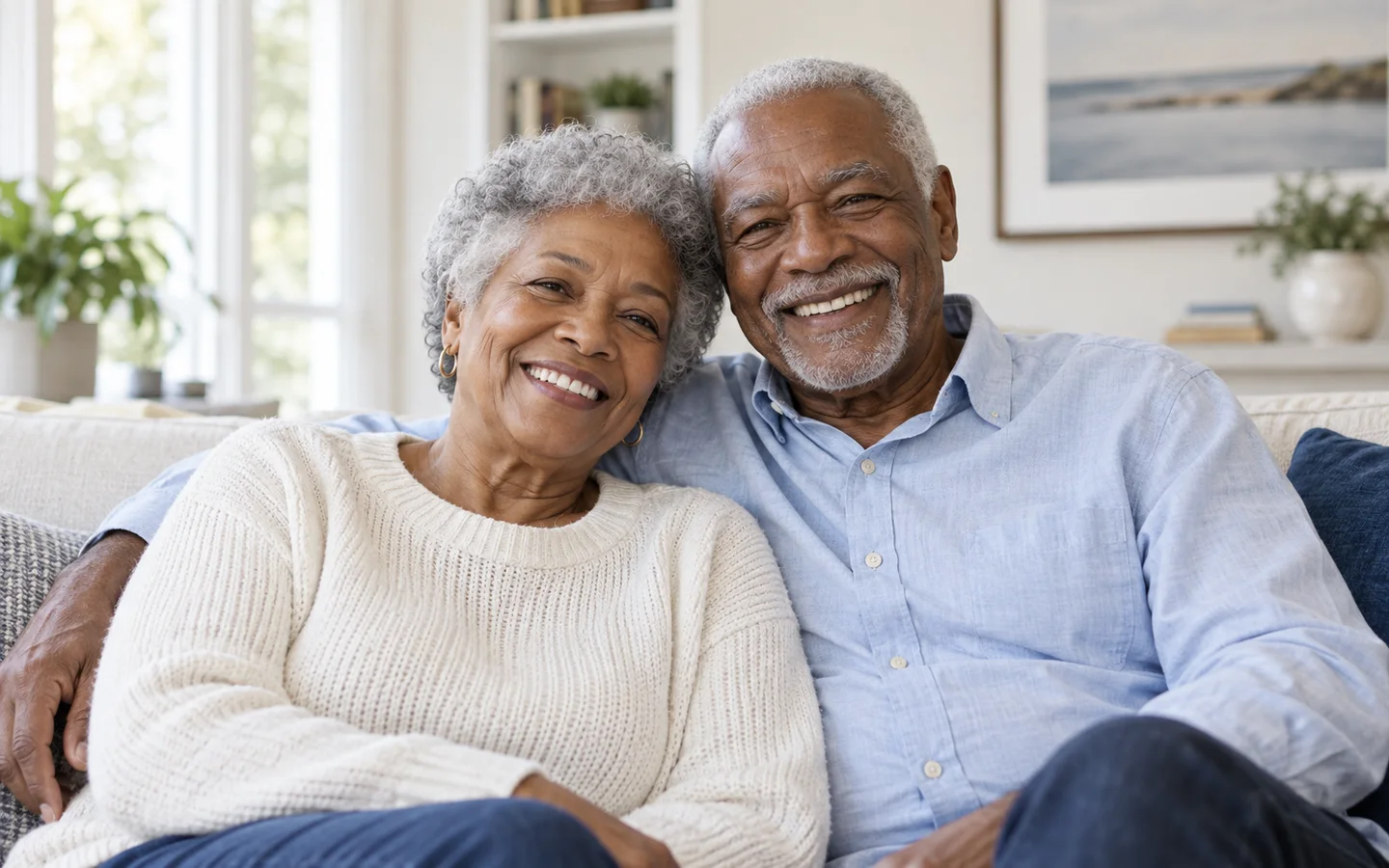 Older couple smiling together at home