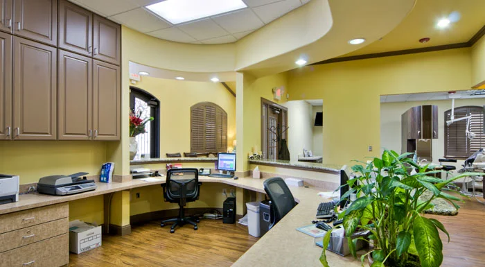 Front desk workspace at Advanced Smiles