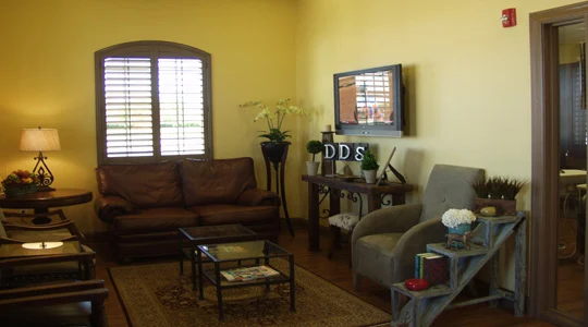 Sitting room with a sofa and armchairs
